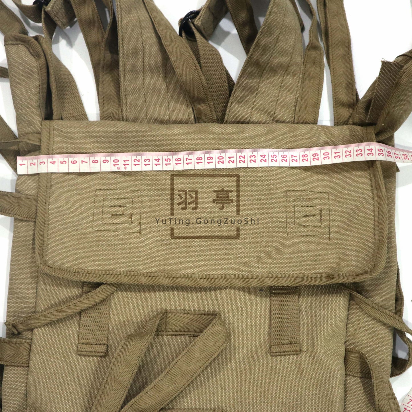 羽亭朝鲜帆布章鱼包八爪包背包影视道具低端复制 Recommended by Yuting: Korean‑theme canvas “octopus‑style” knapsack, basic reproduction, movie‑scene prop